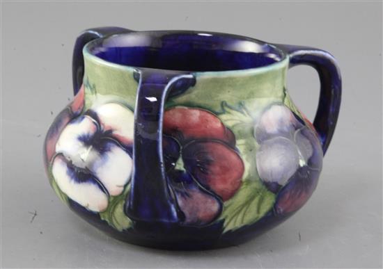 A Moorcroft pansy pattern three handle vase, second quarter 20th century, height 9cm width 14cm